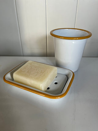 White enamel soap dish with mustard yellow rim