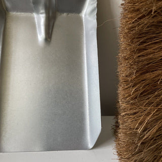 Metal and wood dustpan and brush